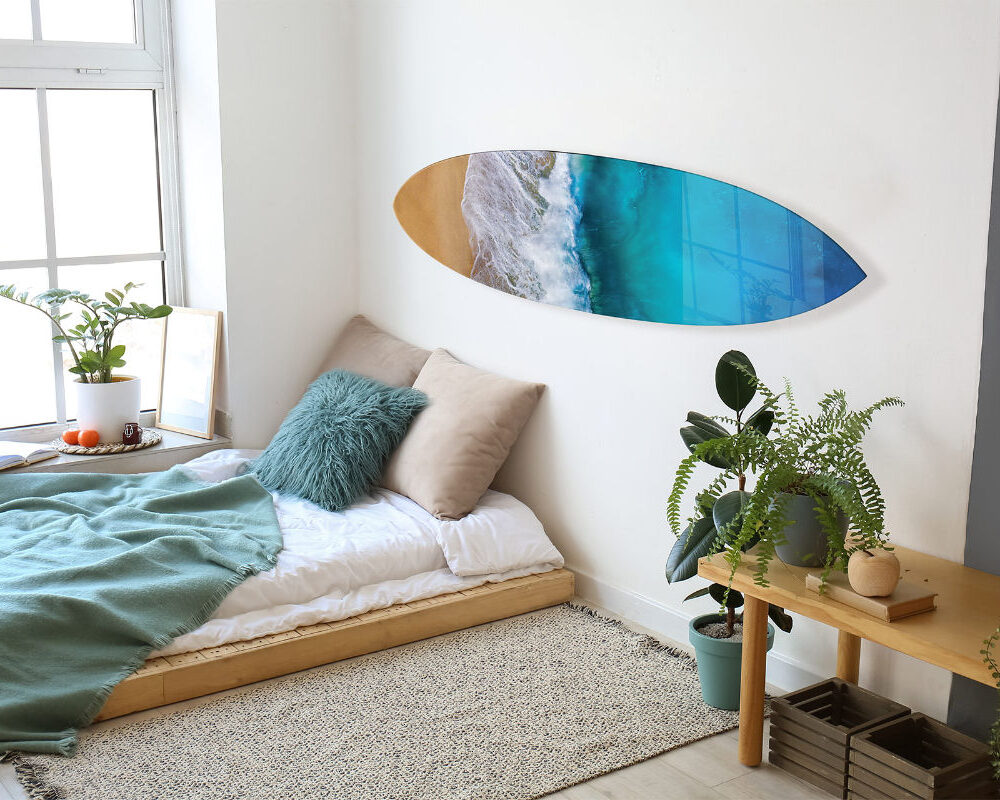 Three custom acrylic surfboard prints displayed on wall near kitchen — beach photo wall art by PrintMyJourney